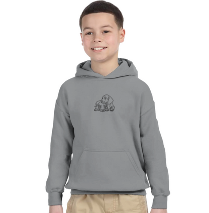 Child wearing a grey personalized dog line art hoodie featuring a minimalist black pet illustration, custom design printed on kids hoodie.
